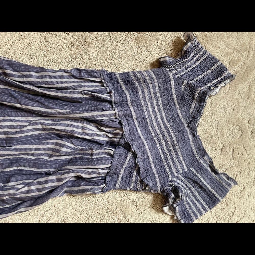 This is beautiful long navy blue dress with white stripes.